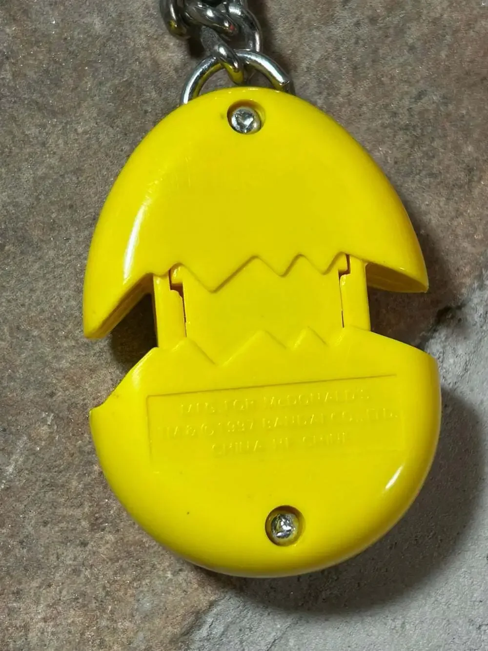 McDonalds Tamagotchi Keychains Orange and Yellow